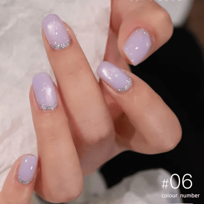 Lavender Ballet cat eye gel polish set with 7 soft purple shades featuring magnetic cat eye gel polish that creates a dreamy 3D nail effect with delicate shimmer and reflective nail design, perfect for graceful professional gel manicures with salon-quality shine and multidimensional depth.