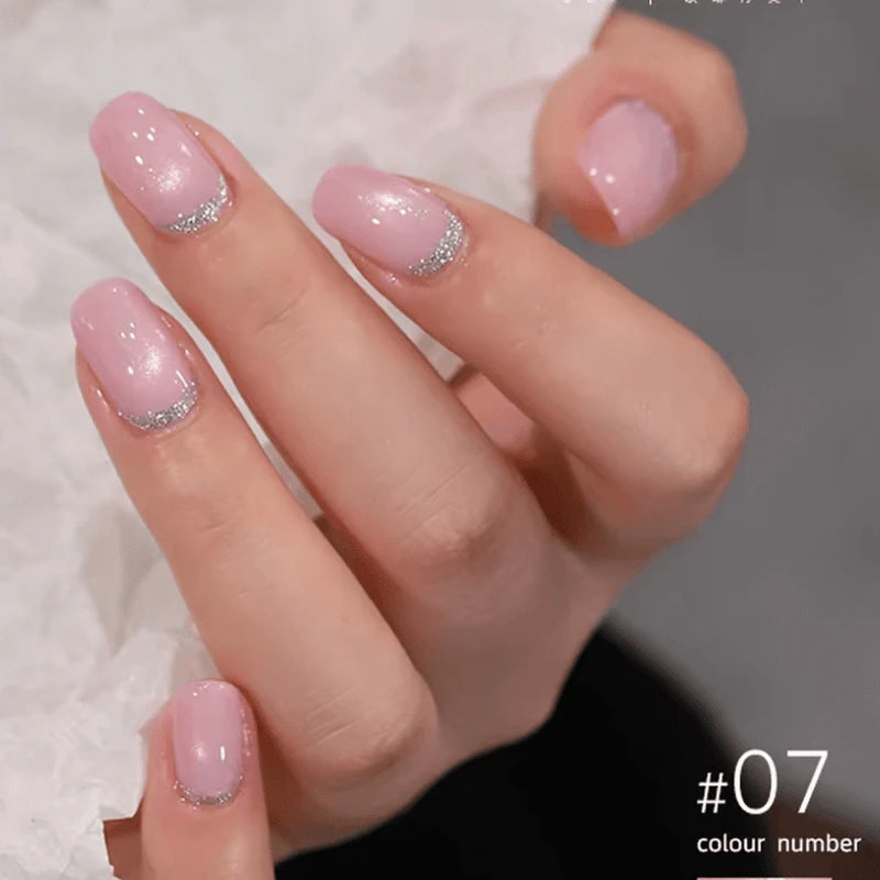 Light Pink Ballet cat eye gel polish set with 7 soft, romantic shades featuring magnetic cat eye gel polish that creates a delicate 3D nail effect with shimmering reflective design, perfect for elegant professional gel manicures with salon-quality shine and multidimensional depth.