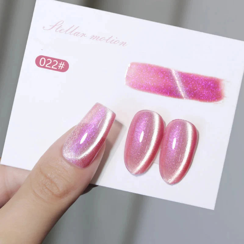 PinkStar22 magnetic cat eye gel polish creating a luminous pink 3D nail effect with sparkling shimmer and reflective nail design, perfect for stylish nail art and professional gel manicures, delivering salon-quality shine and multidimensional depth on beautifully polished nails.