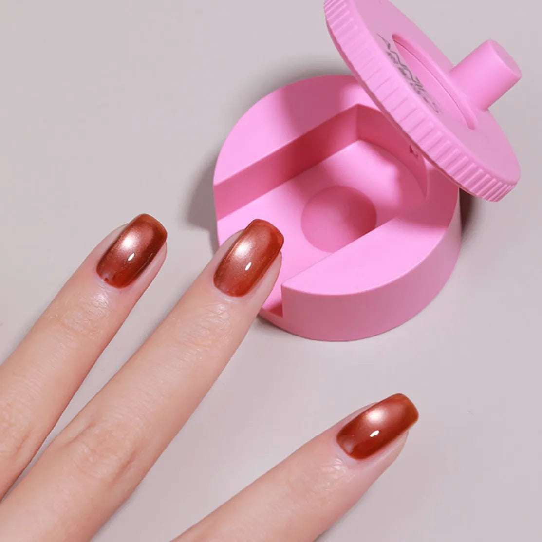 Rotary cat eye magnet bead effect nail art tool designed for magnetic cat eye gel polish, creating stunning 3D bead and glass-like nail effects with precision, perfect for reflective nail designs and professional salon-quality manicures or creative DIY nail art.